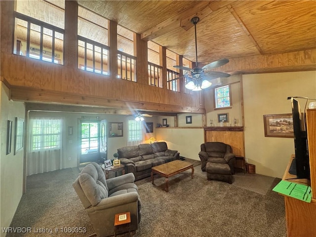 6538 110th Rd, Red Oak, OK 74563 - living room with wood ceiling, carpet flooring, a high ceiling, and ceiling fan