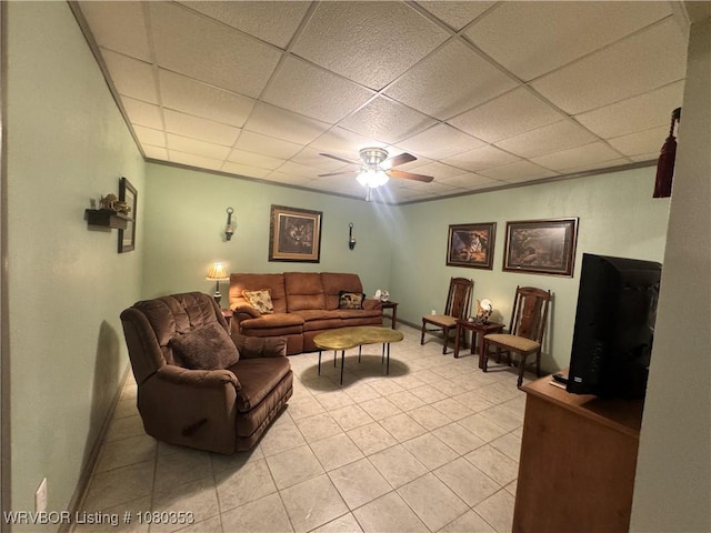 6538 110th Rd, Red Oak, OK 74563 - living room featuring a paneled ceiling, ceiling fan, and light tile patterned flooring