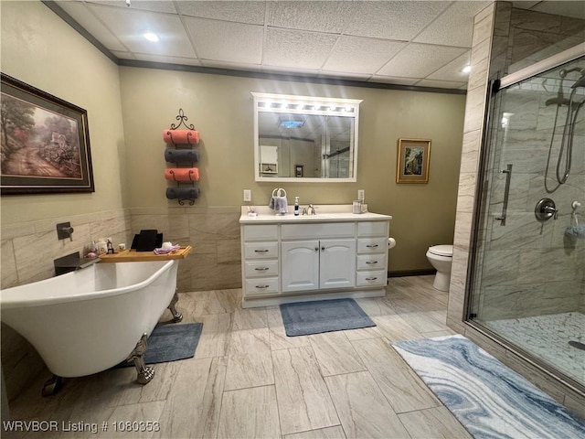 6538 110th Rd, Red Oak, OK 74563 - full bath with a shower stall, a soaking tub, tile walls, and vanity