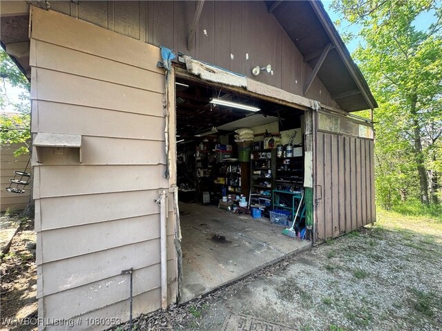 6538 110th Rd, Red Oak, OK 74563 - exterior space with an outdoor structure and a garage