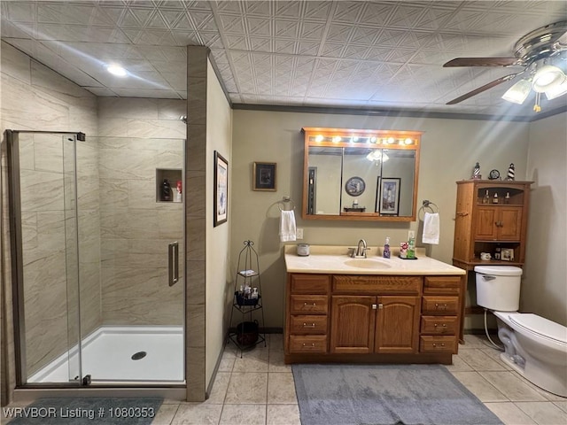6538 110th Rd, Red Oak, OK 74563 - bathroom featuring tile patterned floors, a stall shower, ceiling fan, and toilet