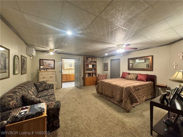 6538 110th Rd, Red Oak, OK 74563 - bedroom with a wall mounted air conditioner, a ceiling fan, ensuite bathroom, and carpet