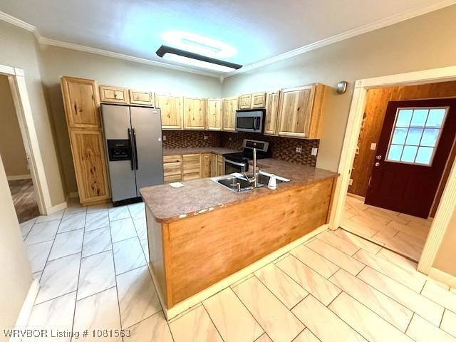 1434 W College St, Ozark, AR 72949 - kitchen with stainless steel appliances, light marble finish flooring, a sink, a peninsula, and crown molding