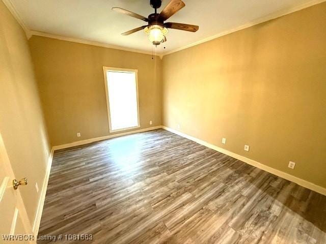 1434 W College St, Ozark, AR 72949 - empty room featuring wood finished floors, a ceiling fan, crown molding, and baseboards