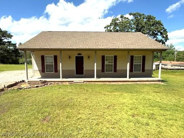 1434 W College St, Ozark, AR 72949 - view of front of property with covered porch and a front yard