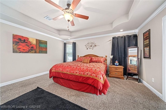 479872 E 1080th Rd, Muldrow, OK 74948 - carpeted bedroom with a tray ceiling, a ceiling fan, ornamental molding, and recessed lighting