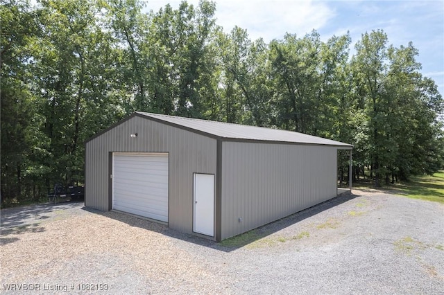 479872 E 1080th Rd, Muldrow, OK 74948 - detached garage featuring gravel driveway
