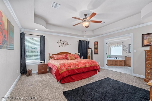 479872 E 1080th Rd, Muldrow, OK 74948 - bedroom with light carpet, a tray ceiling, crown molding, ensuite bathroom, and a ceiling fan