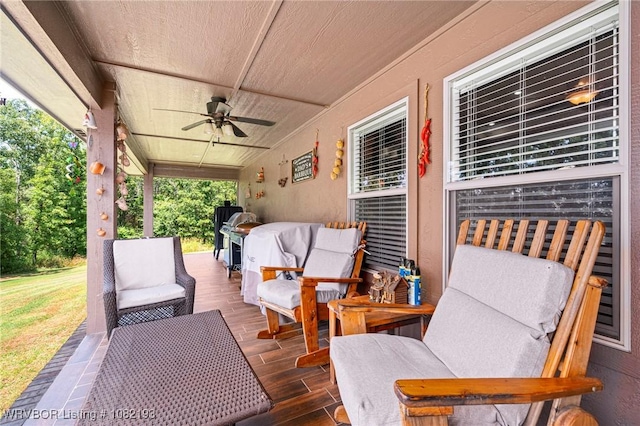 479872 E 1080th Rd, Muldrow, OK 74948 - wooden terrace with ceiling fan and an outdoor living space