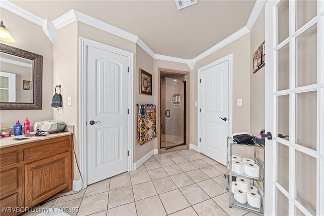 479872 E 1080th Rd, Muldrow, OK 74948 - entryway featuring ornamental molding and light tile patterned floors