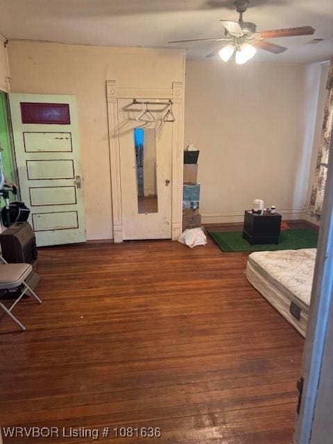 24 S 3rd St, Paris, AR 72855 - entryway featuring ceiling fan and wood finished floors