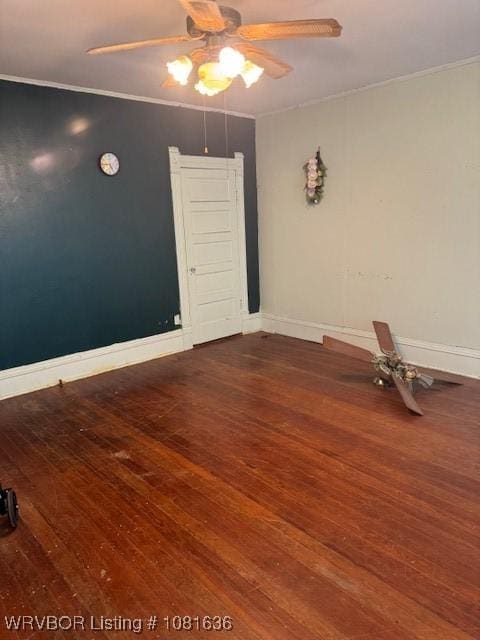 24 S 3rd St, Paris, AR 72855 - spare room with crown molding, wood-type flooring, and ceiling fan