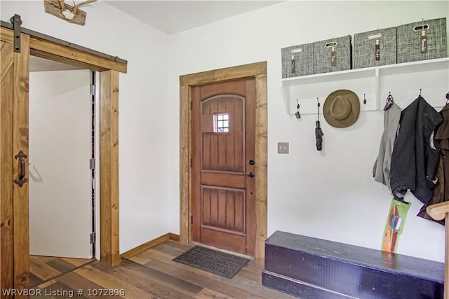 mudroom with hardwood / wood-style floors