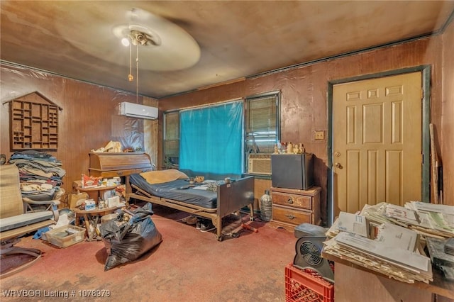 bedroom featuring ceiling fan, carpet flooring, and an AC wall unit