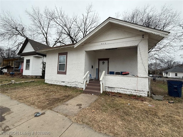 bungalow-style home featuring a porch