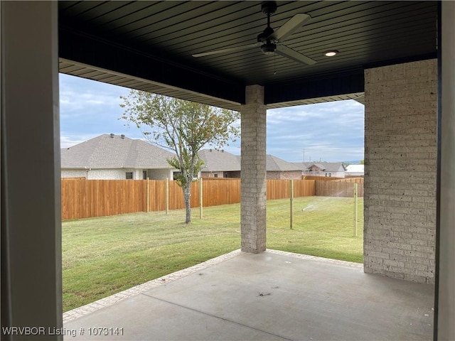 view of patio featuring ceiling fan