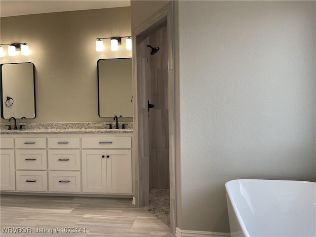 bathroom with vanity and plus walk in shower