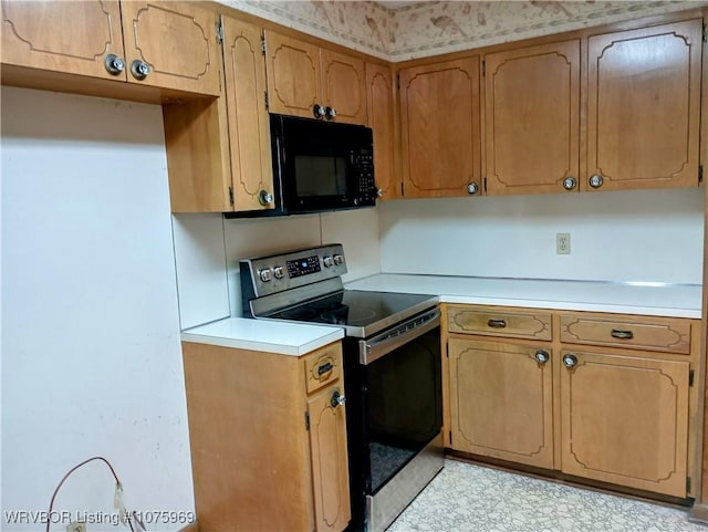 kitchen featuring electric range