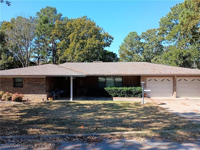 ranch-style home featuring a garage