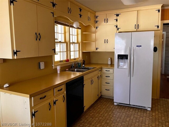 kitchen with dishwasher, white fridge with ice dispenser, and sink