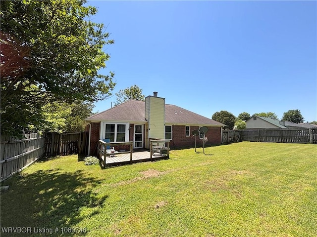 2114 Breckenridge Ter, Greenwood, AR 72936 - back of property with a chimney, brick siding, and a wooden deck
