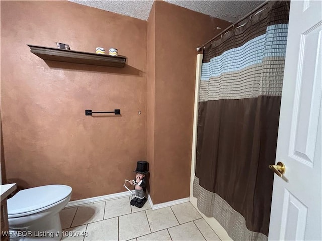 2114 Breckenridge Ter, Greenwood, AR 72936 - full bathroom with toilet, tile patterned flooring, a shower with curtain, baseboards, and a textured ceiling
