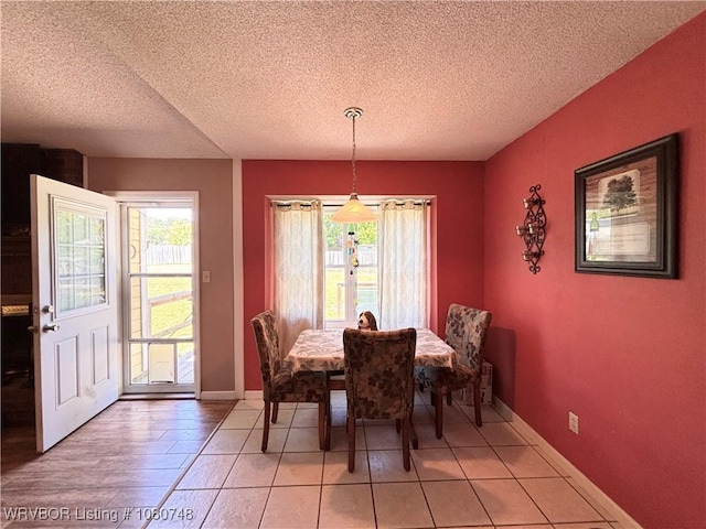 2114 Breckenridge Ter, Greenwood, AR 72936 - dining room with a textured ceiling and baseboards