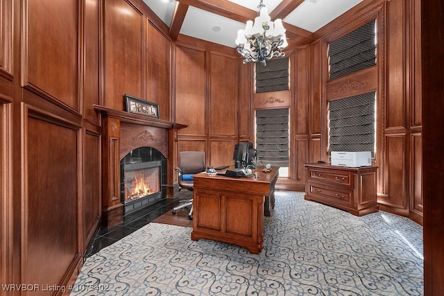 home office with a notable chandelier, beam ceiling, and wooden walls