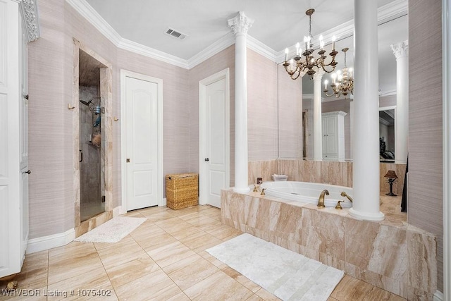 bathroom with shower with separate bathtub, decorative columns, an inviting chandelier, and ornamental molding