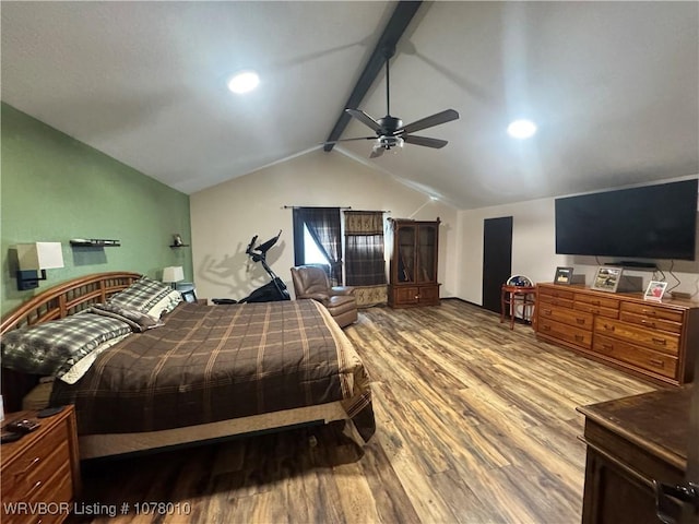 bedroom with hardwood / wood-style floors, vaulted ceiling with beams, and ceiling fan