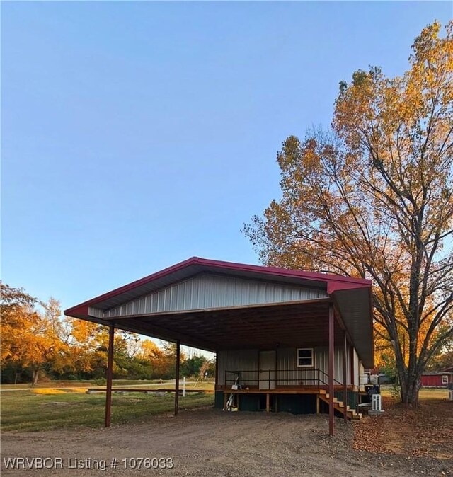 exterior space featuring a carport