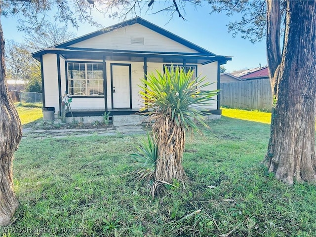 exterior space featuring a front lawn