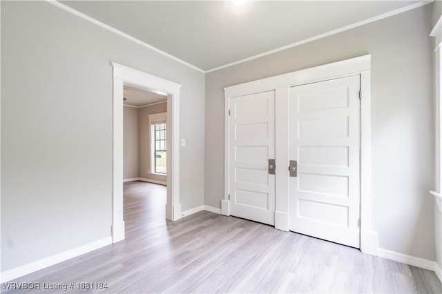 408 Denver St, Greenwood, AR 72936 - entrance foyer featuring light wood-type flooring, crown molding, and baseboards