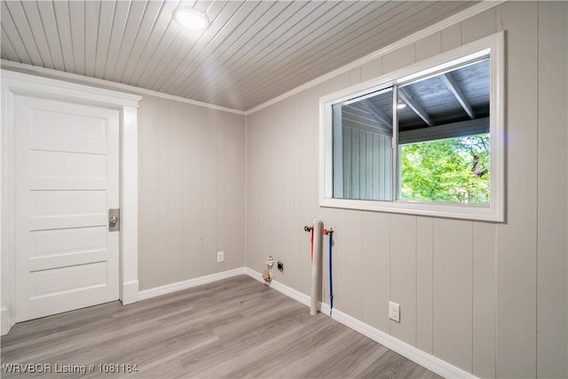 408 Denver St, Greenwood, AR 72936 - empty room featuring light wood finished floors, baseboards, wooden ceiling, and ornamental molding