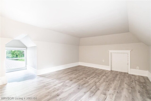 408 Denver St, Greenwood, AR 72936 - bonus room with vaulted ceiling, light wood-style flooring, and baseboards