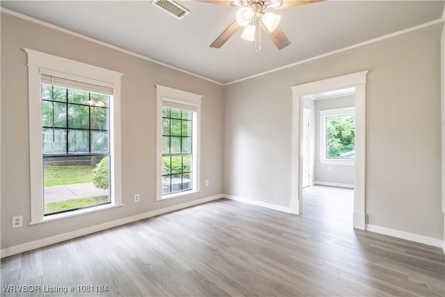 408 Denver St, Greenwood, AR 72936 - spare room featuring baseboards, wood finished floors, ornamental molding, and a ceiling fan