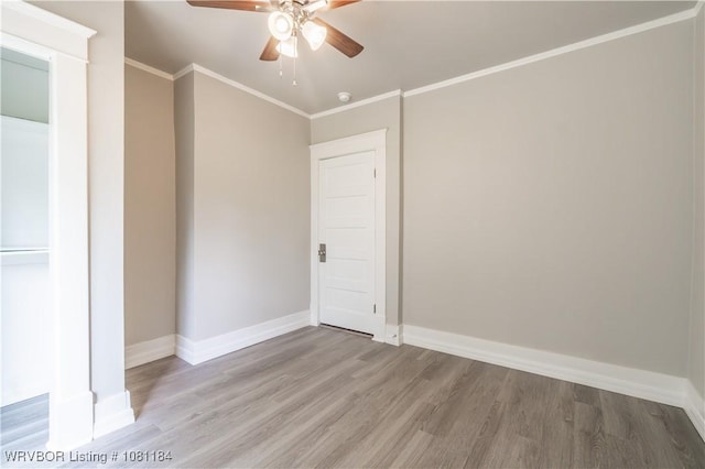 408 Denver St, Greenwood, AR 72936 - unfurnished room featuring wood finished floors, ceiling fan, baseboards, and ornamental molding