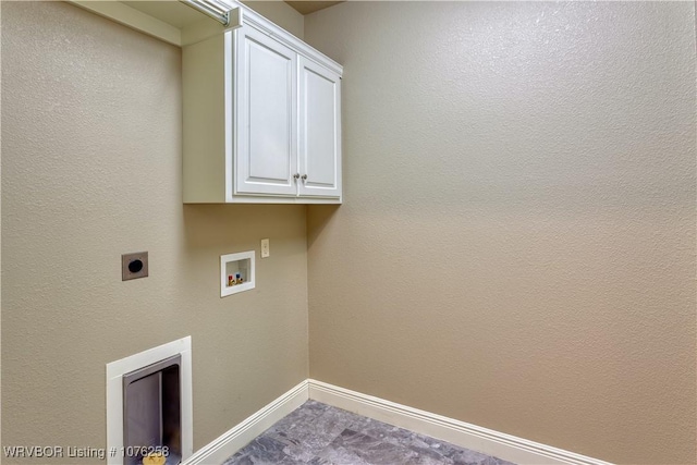 laundry room featuring hookup for an electric dryer, cabinets, and hookup for a washing machine