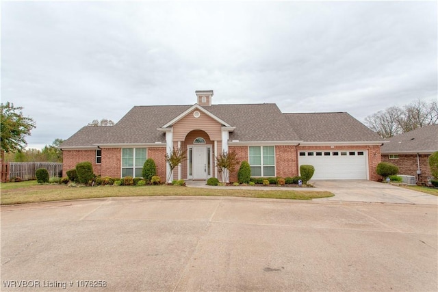 ranch-style home with a garage