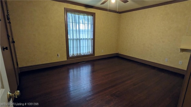 3701 S Cook Rd, Charleston, AR 72933 - empty room with dark wood finished floors, a ceiling fan, ornamental molding, and baseboards