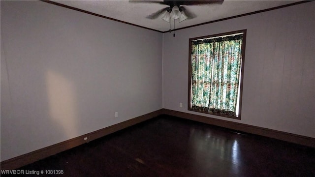 3701 S Cook Rd, Charleston, AR 72933 - spare room with ceiling fan, crown molding, and baseboards