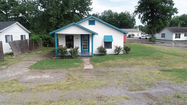 view of front of home with a front yard