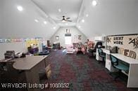 office with lofted ceiling and a ceiling fan