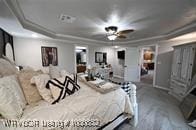 bedroom with a raised ceiling