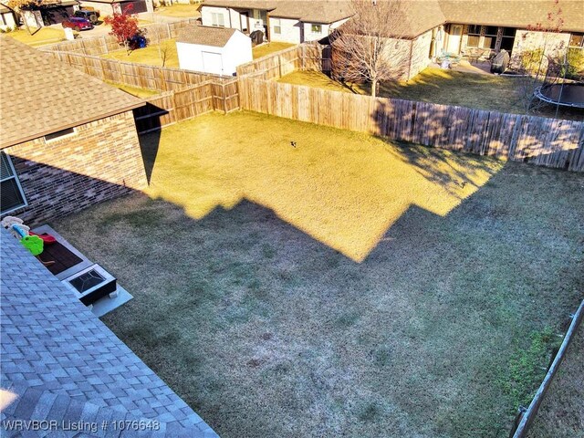 view of yard featuring a trampoline