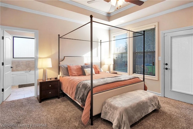 bedroom with connected bathroom, ceiling fan, light colored carpet, and ornamental molding