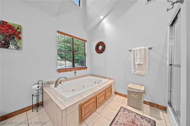 95147 S 4507th Rd, Vian, OK 74962 - bathroom featuring a jetted tub, plenty of natural light, and tile patterned flooring
