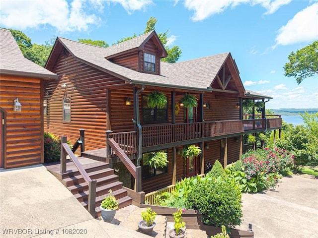 95147 S 4507th Rd, Vian, OK 74962 - view of front of property featuring a shingled roof, stairway, and a water view