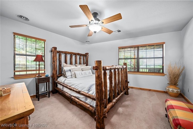 95147 S 4507th Rd, Vian, OK 74962 - carpeted bedroom with baseboards and a ceiling fan