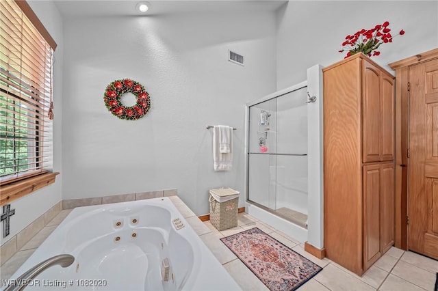 95147 S 4507th Rd, Vian, OK 74962 - full bathroom featuring a shower stall, a tub with jets, and tile patterned floors